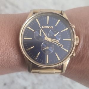 Ladies Nixon Gold Tone w Blue Face watch
